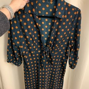 Midi length navy and orange polka dot dress. Vintage style. Size medium.